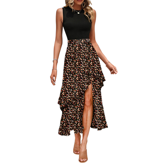 A static front-on view of the contrast floral print maxi dress highlighting the ruffled tiers and the detailed botanical pattern against the solid black sleeveless bodice.