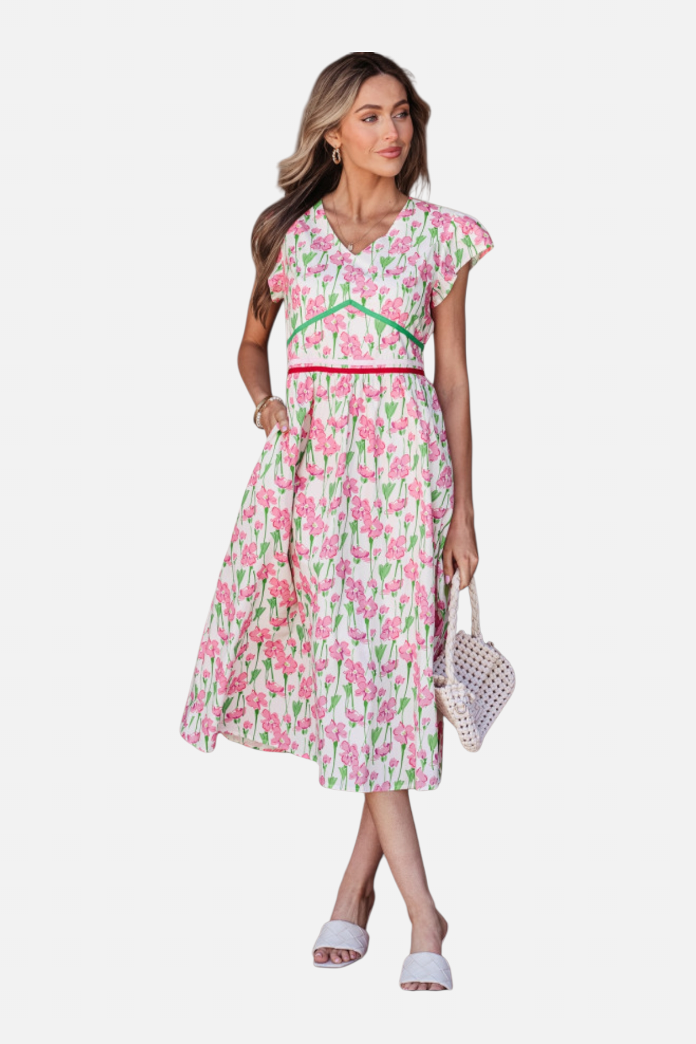 Woman wearing a floral dress on a white background
