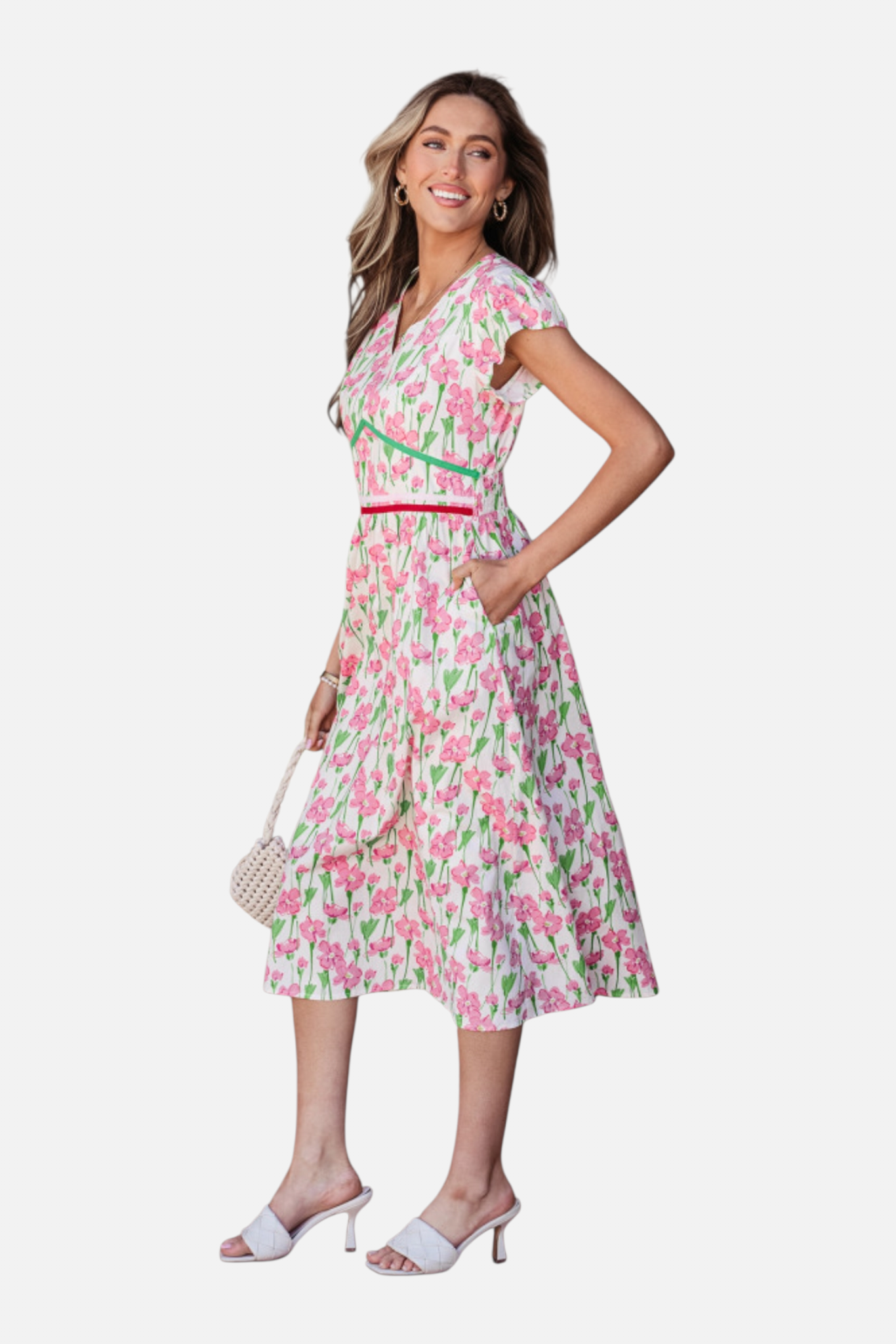 Woman wearing a floral dress on a white background