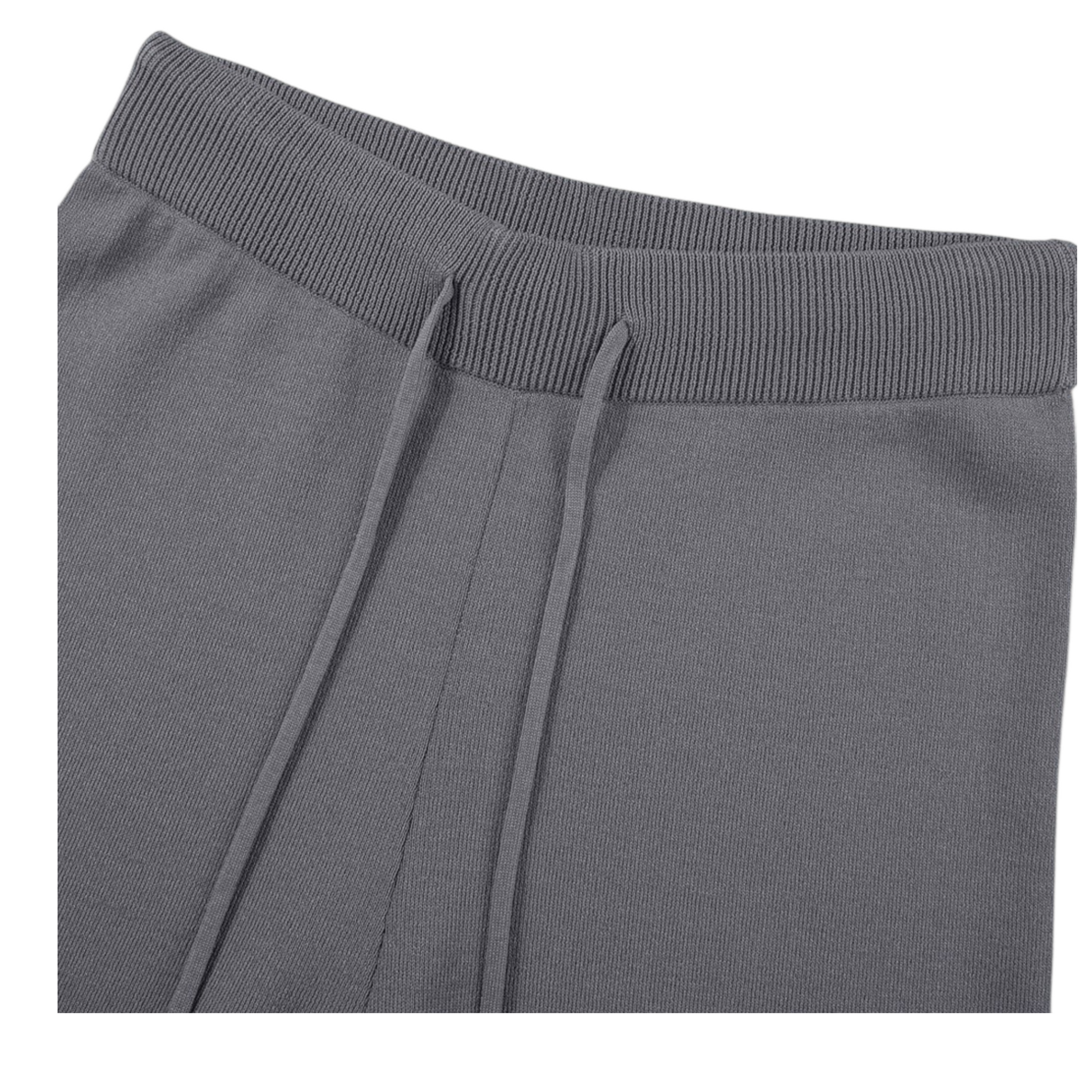 Gray sweatpants with drawstrings on a white background