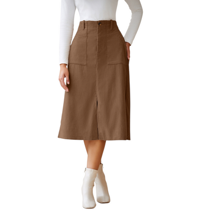 Brown skirt worn by a person on a white background