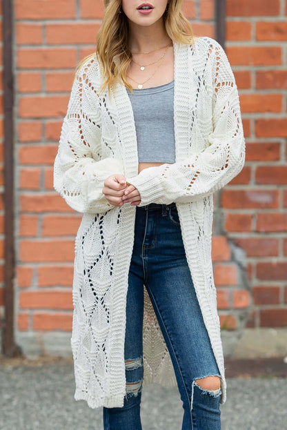 Lightweight and breathable white knit cardigan, great for layering in all seasons.