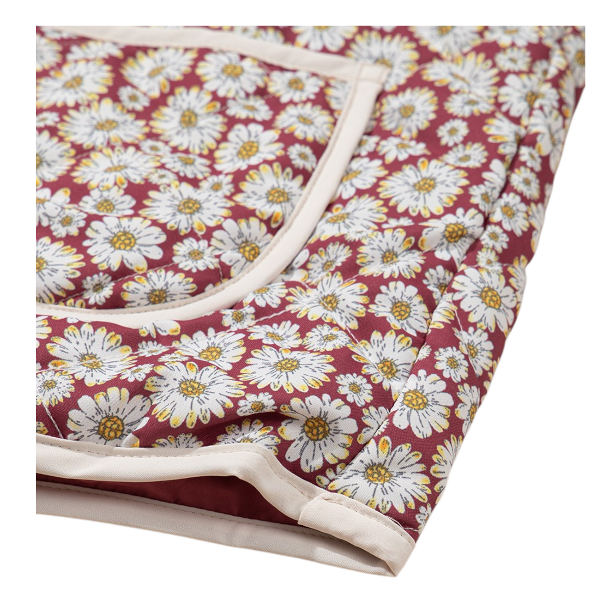 Floral patterned fabric with white daisies on a red background