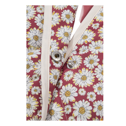 Floral-patterned fabric with white buttons on a red background