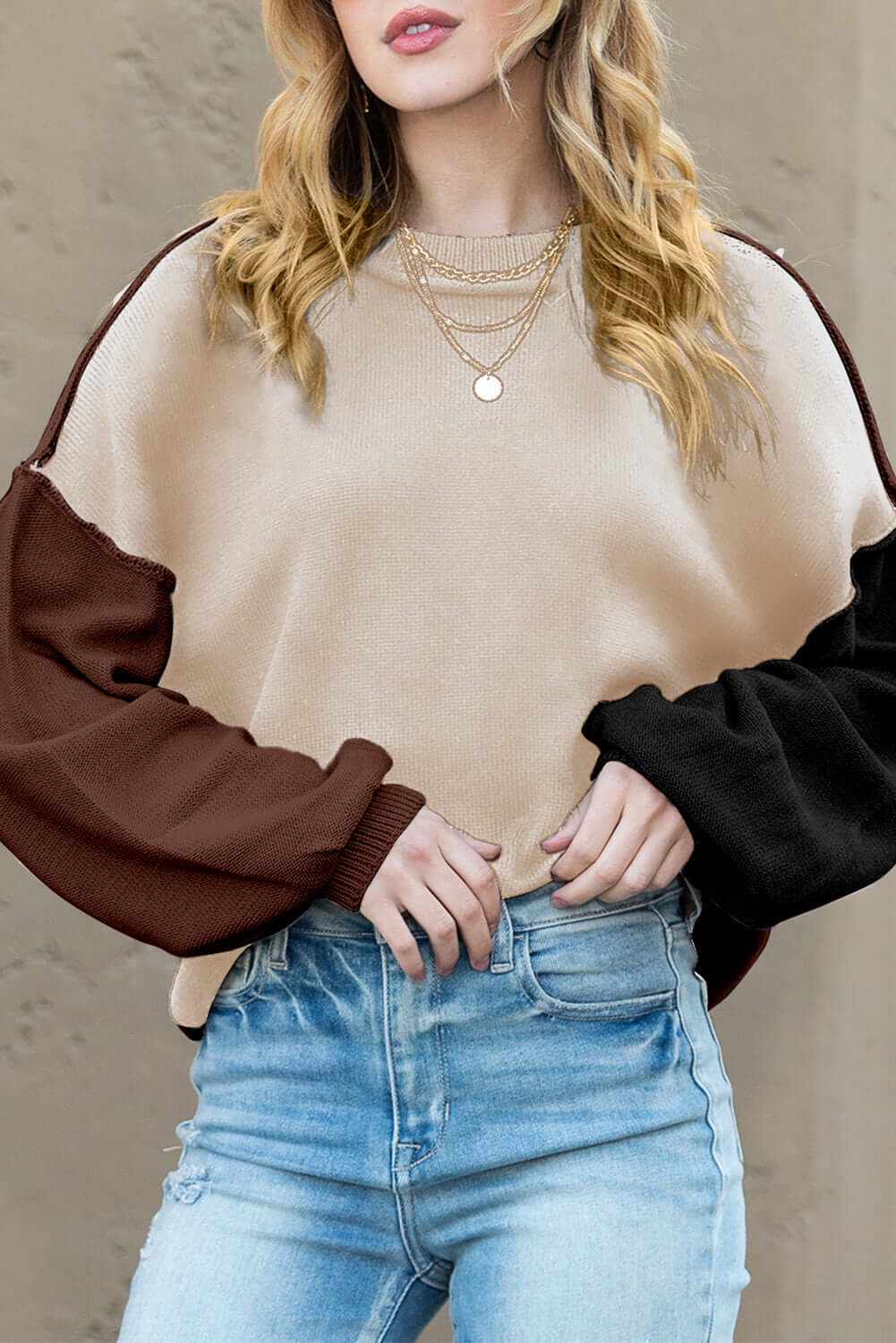 Detailed shot of knit texture, highlighting the softness of this autumn jumper
