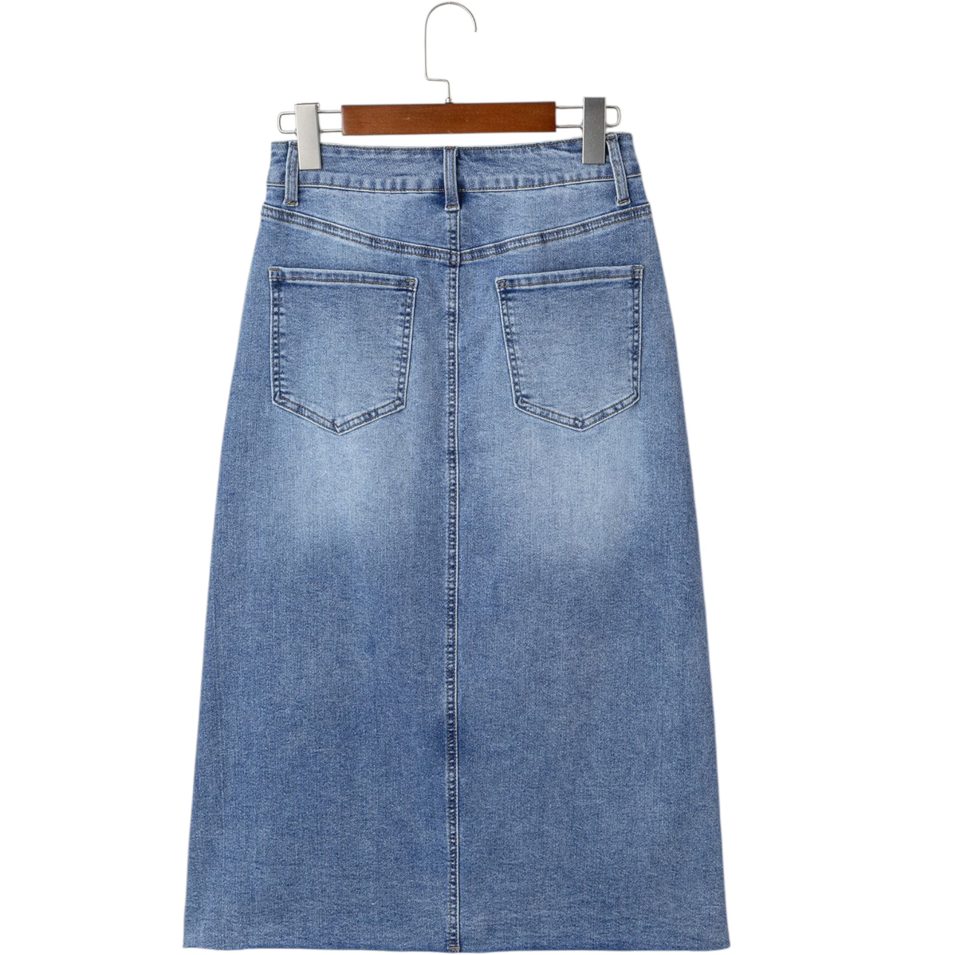 Blue denim skirt on a hanger against a white background