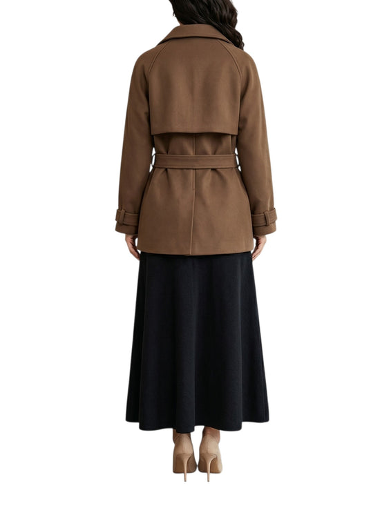 Brown trench coat worn by a person on a white background back view