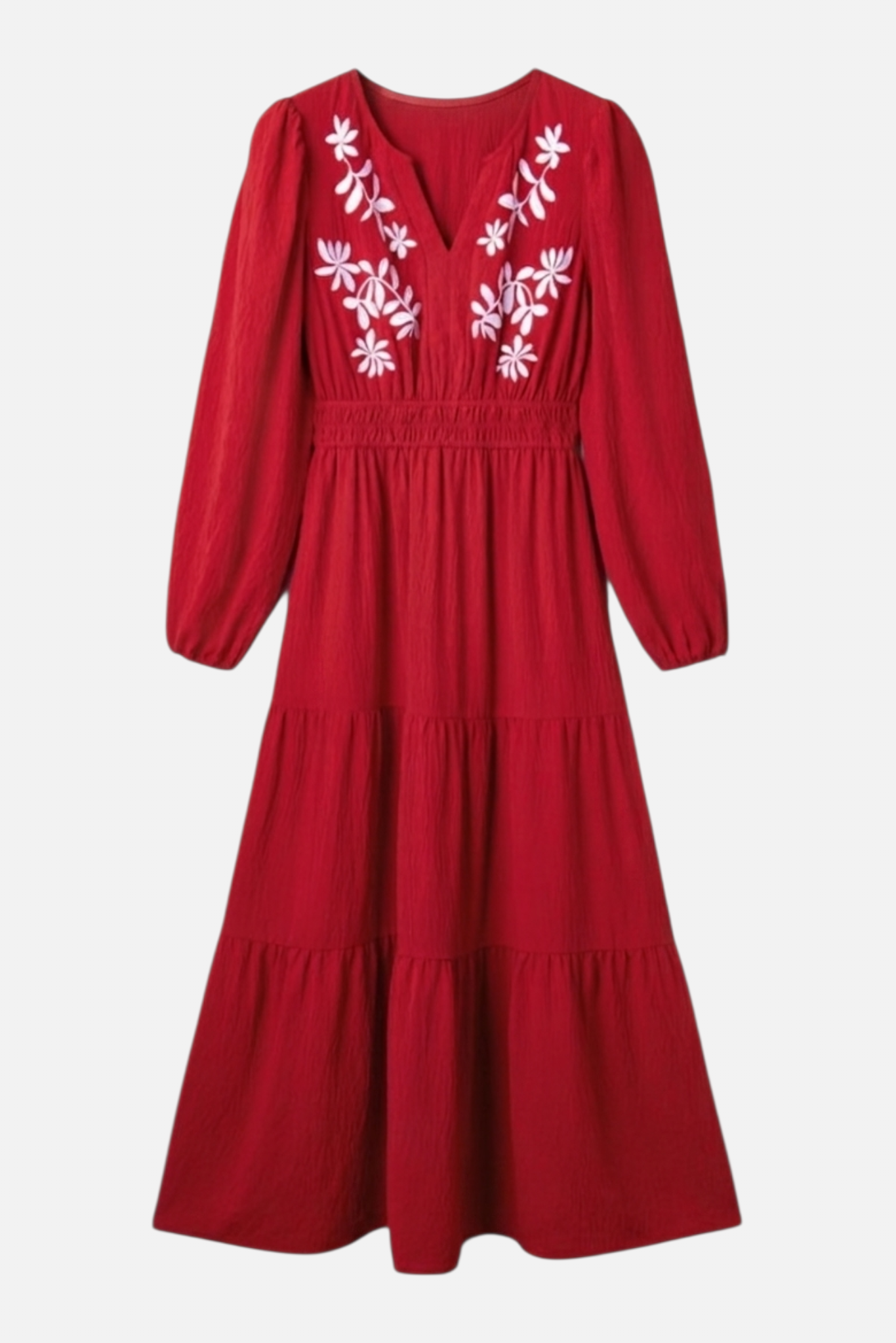 A flat-lay product image of the burgundy tiered maxi dress featuring intricate white floral contrast embroidery on the V-neck bodice and long balloon sleeves.