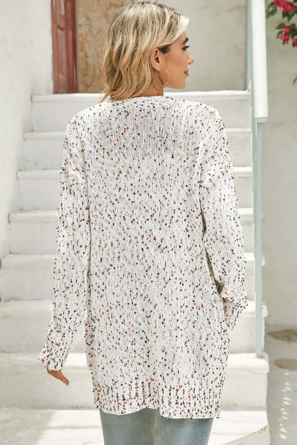 Back view of the cardigan, showcasing its effortless flow and stylish look.