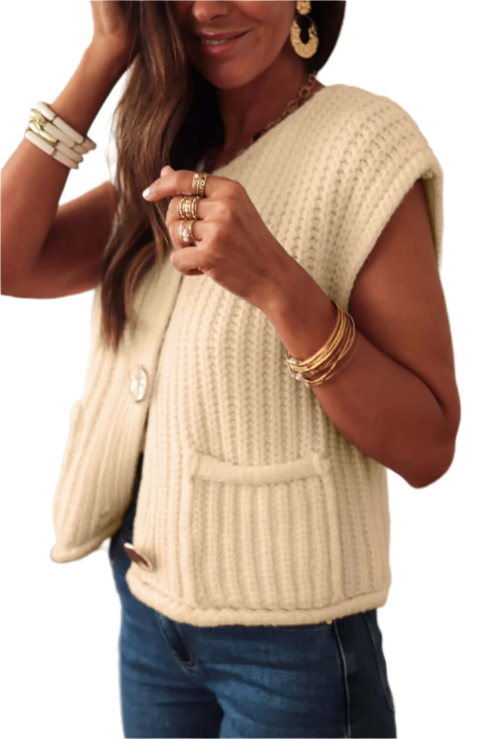 Cosy beige ribbed knit vest, perfect for layering or wearing solo.
