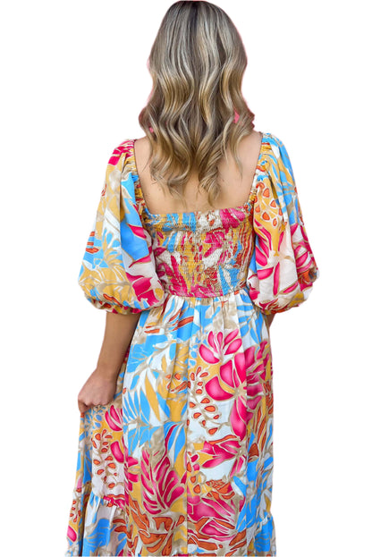 Tropical print rose red midi dress with puff sleeves and smocked bodice, breathable and stylish for versatile wear. Back view.