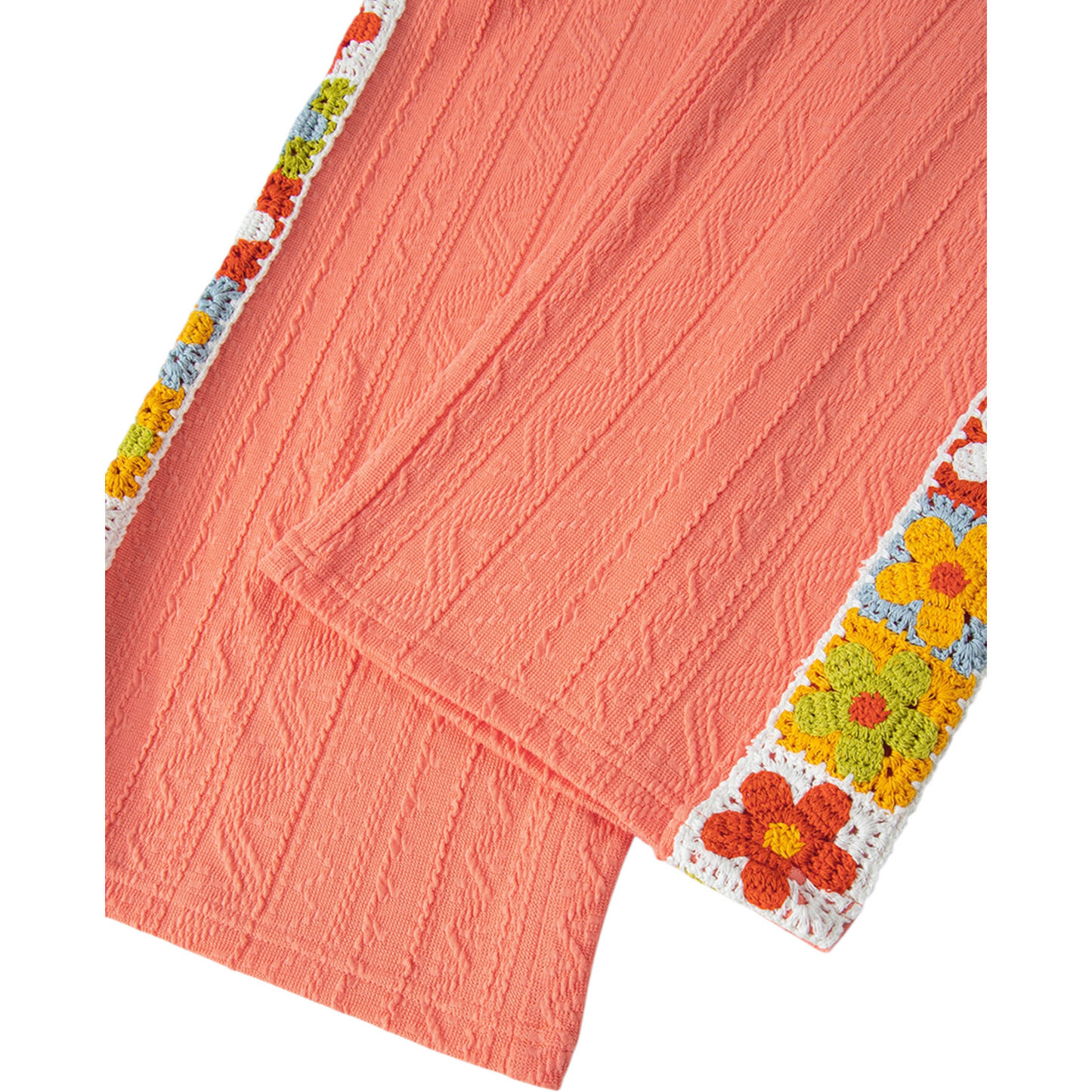 Coral fabric with a colorful floral crochet border on a white background
