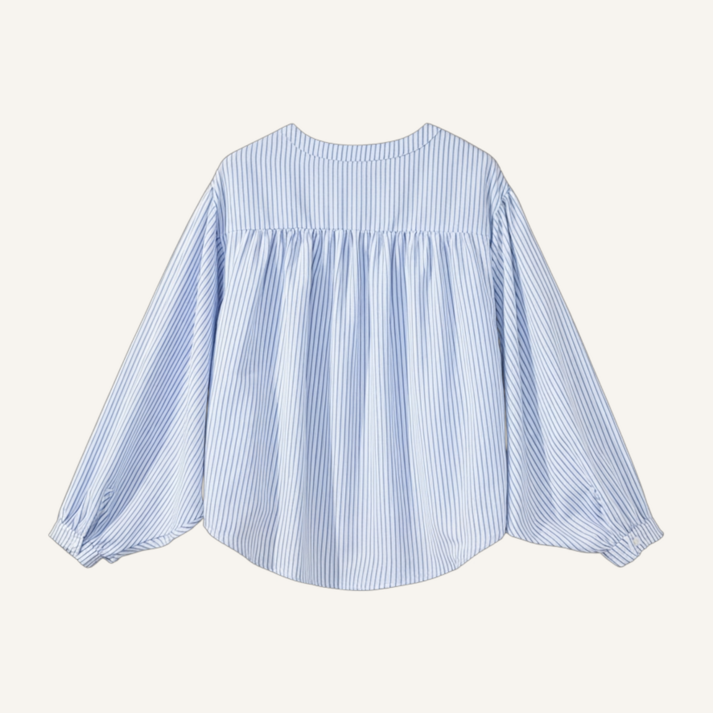 Rear view of a blue and white pinstriped tunic showcasing the relaxed, flowy fit and gathered yoke detail.