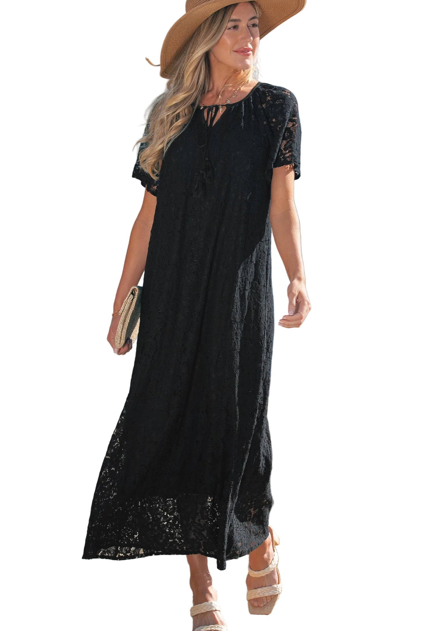 Woman wearing a black lace dress with a white background
