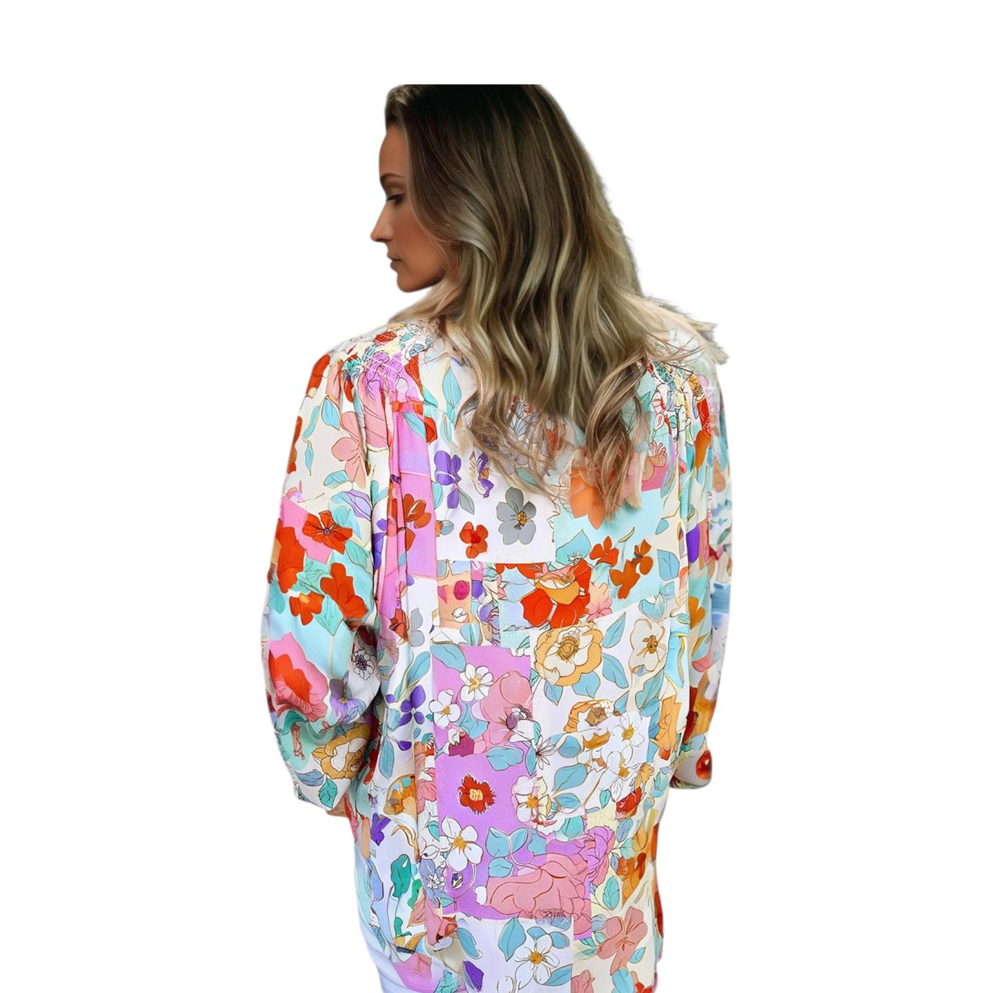 Woman wearing a colorful floral dress on a white background