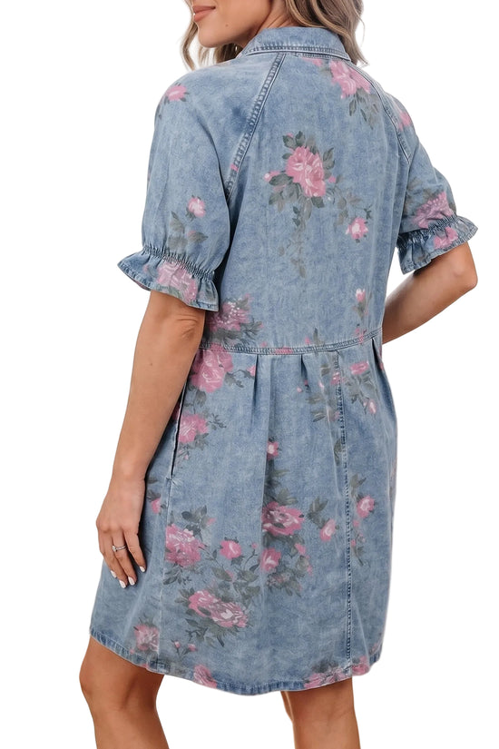 Rear three-quarter view of the model showcasing the western yoke paneling and gathered elastic ruffle cuffs on the floral denim dress.