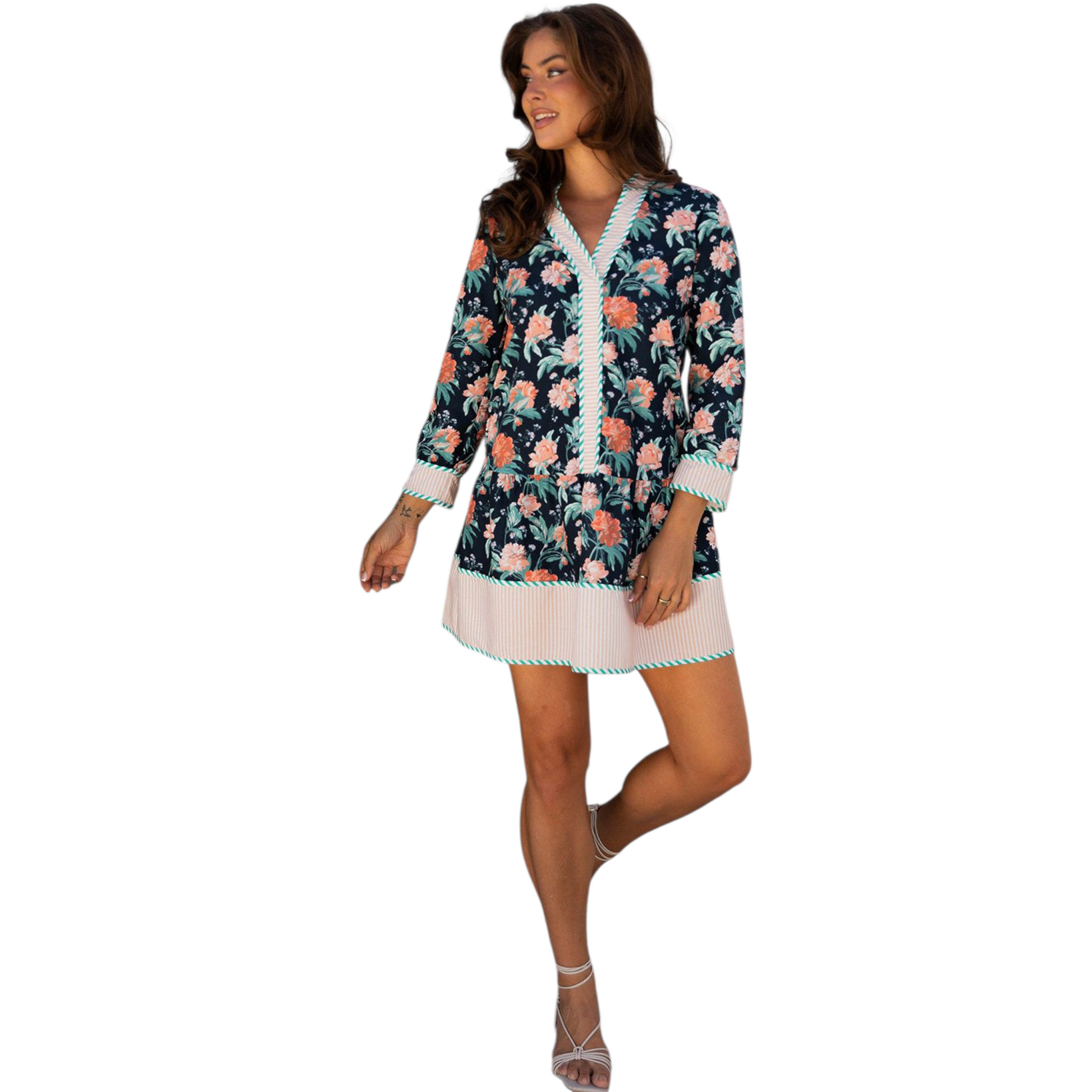 Woman wearing a floral dress with a white background