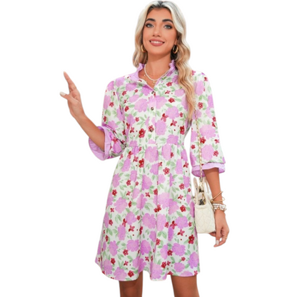 Floral print mini dress with a ruffle neck and pockets.