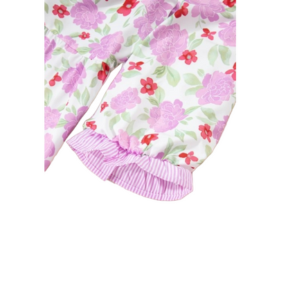 Floral print mini dress with a ruffle neck and pockets. Sleeve detailing.