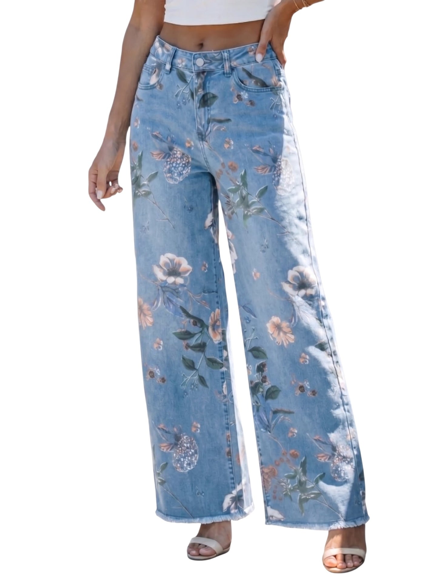 Floral-patterned jeans worn by a person on a white background