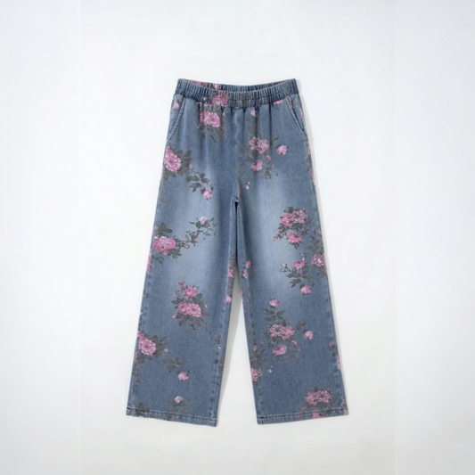 High-quality front view flat lay of the vintage-inspired floral denim jeans, showcasing the wide-leg cut and soft blue wash.
