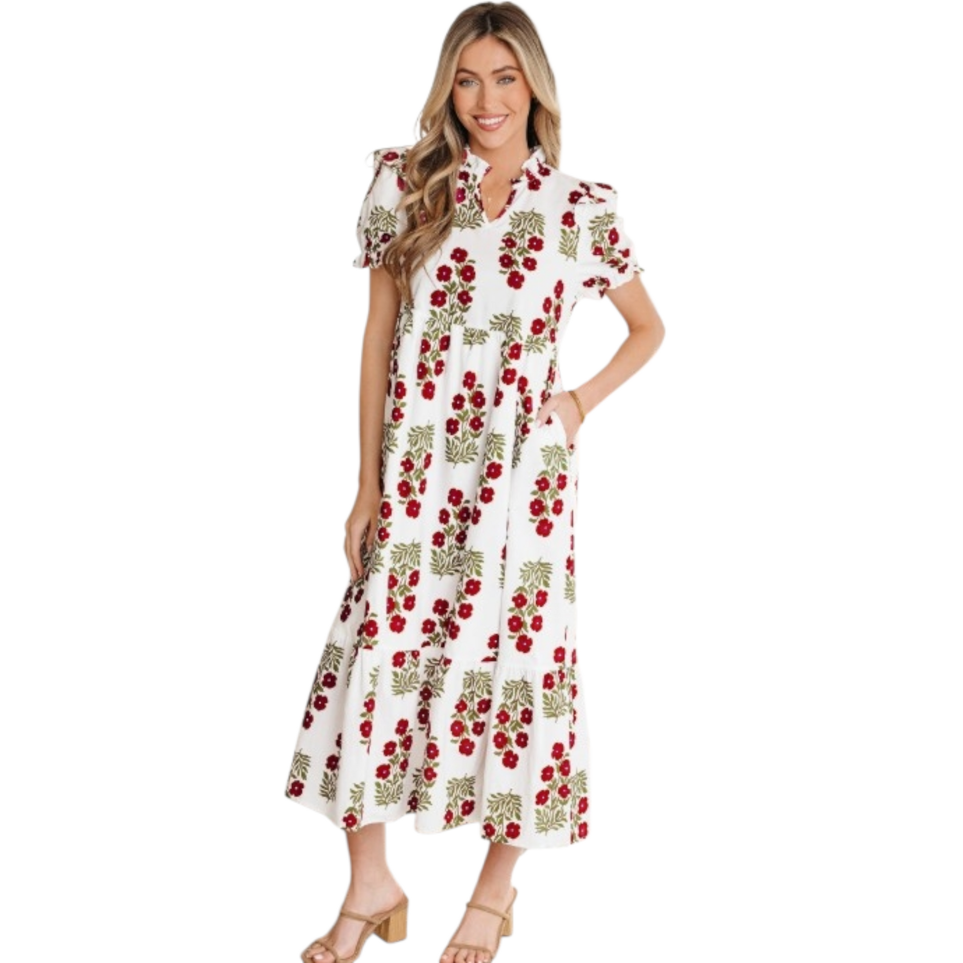 Woman wearing a white dress with red floral pattern on a white background