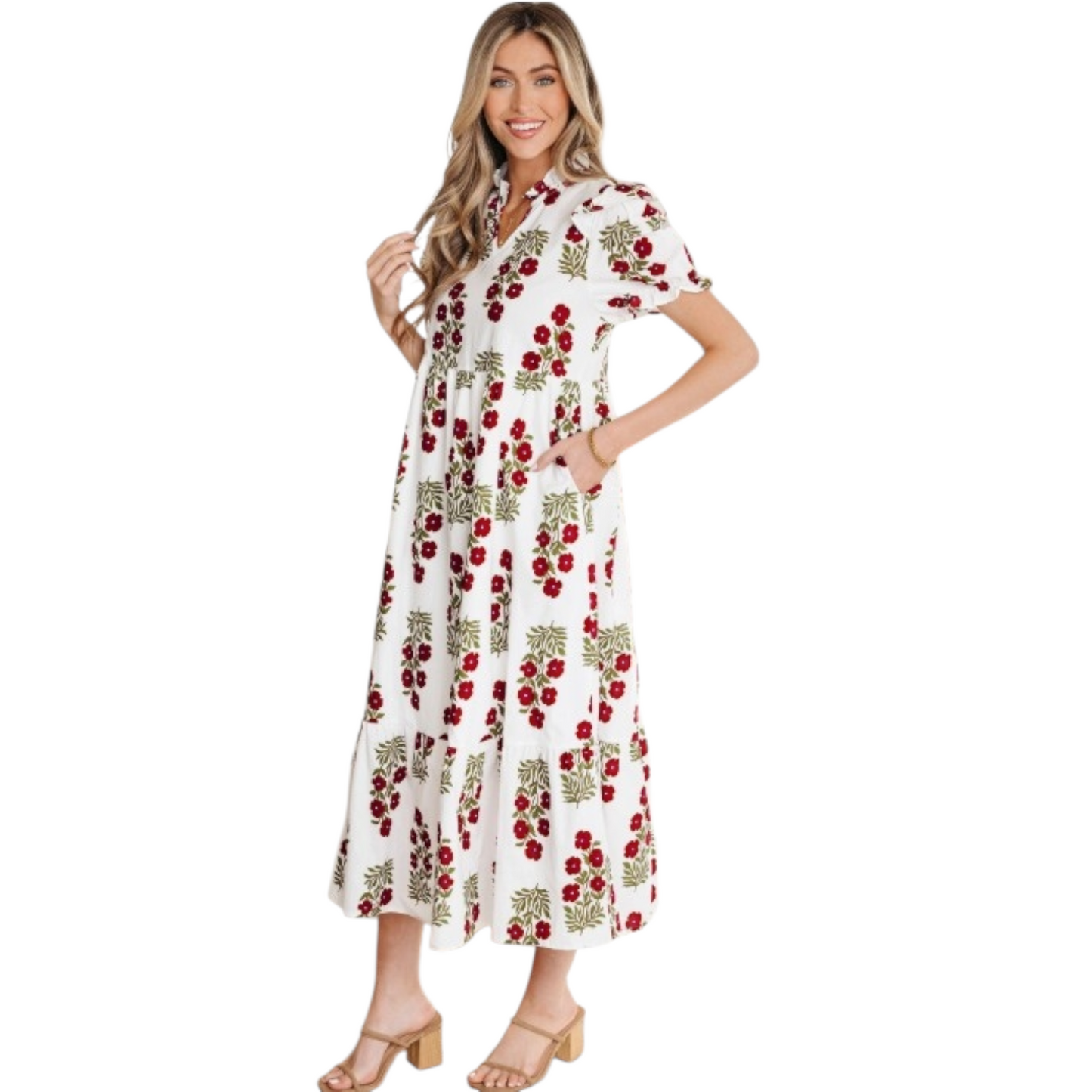 Woman wearing a white and red floral cotton midi dress with puff sleeves and a tiered ruffle hem.