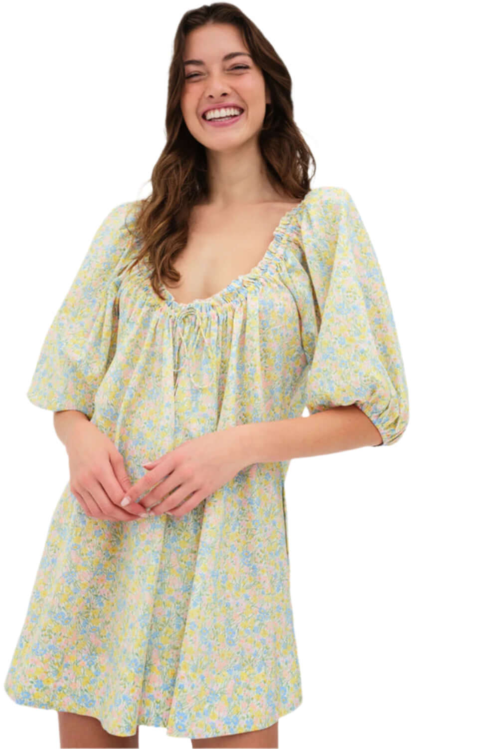Lightweight green mini dress with floral prints, tie-neck closure, and puff sleeves.