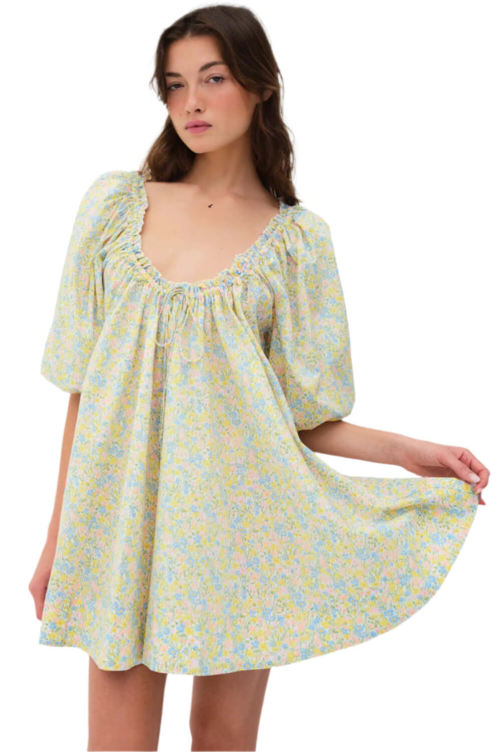 Green puff sleeve mini dress with a floral print, styled for an Australian summer look.