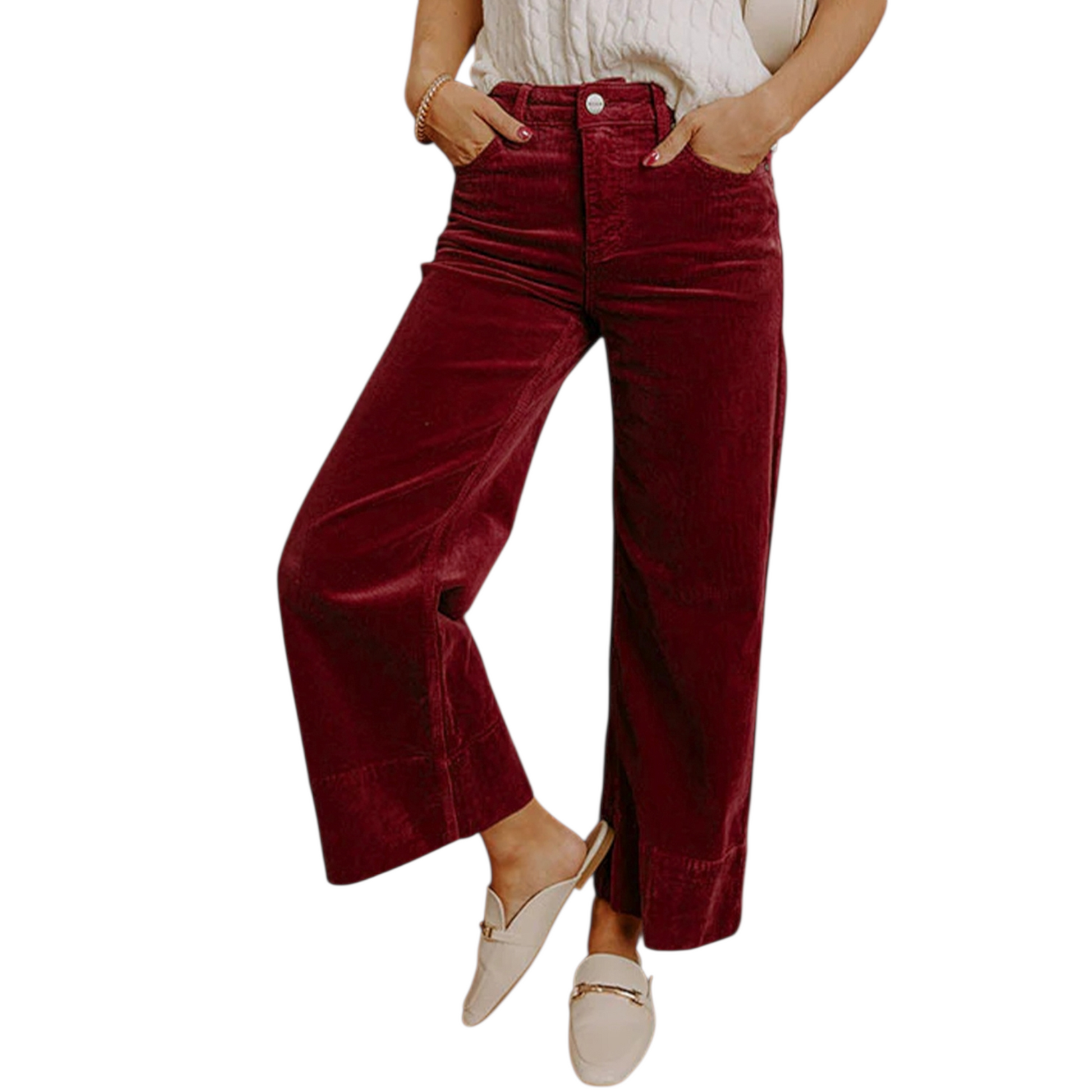 Person wearing burgundy high-rise wide-leg corduroy trousers with a white knit sweater and cream loafers.