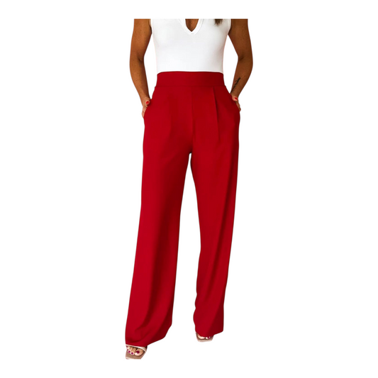 Red wide-leg pants worn by a person on a white background