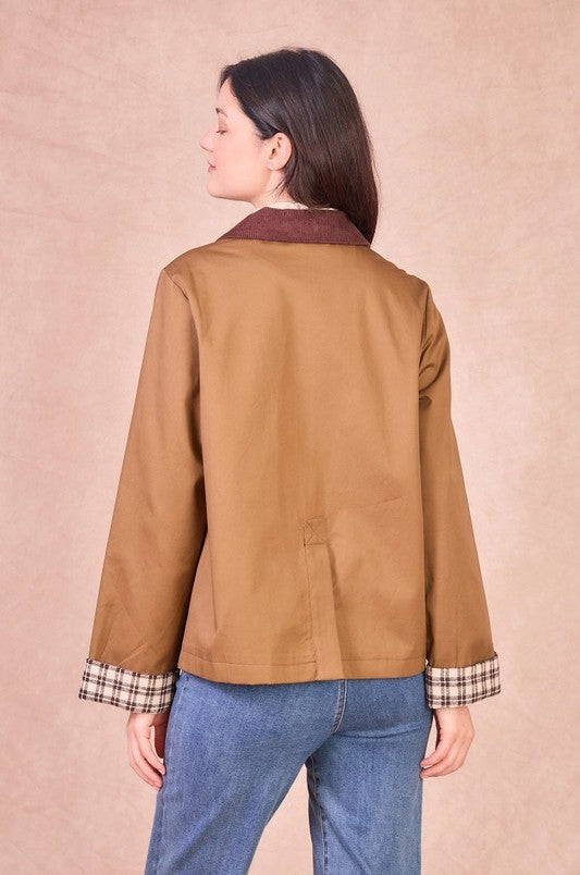 Rear view of a khaki cotton jacket showing the relaxed fit, straight hem, and back pleat detail for comfort.