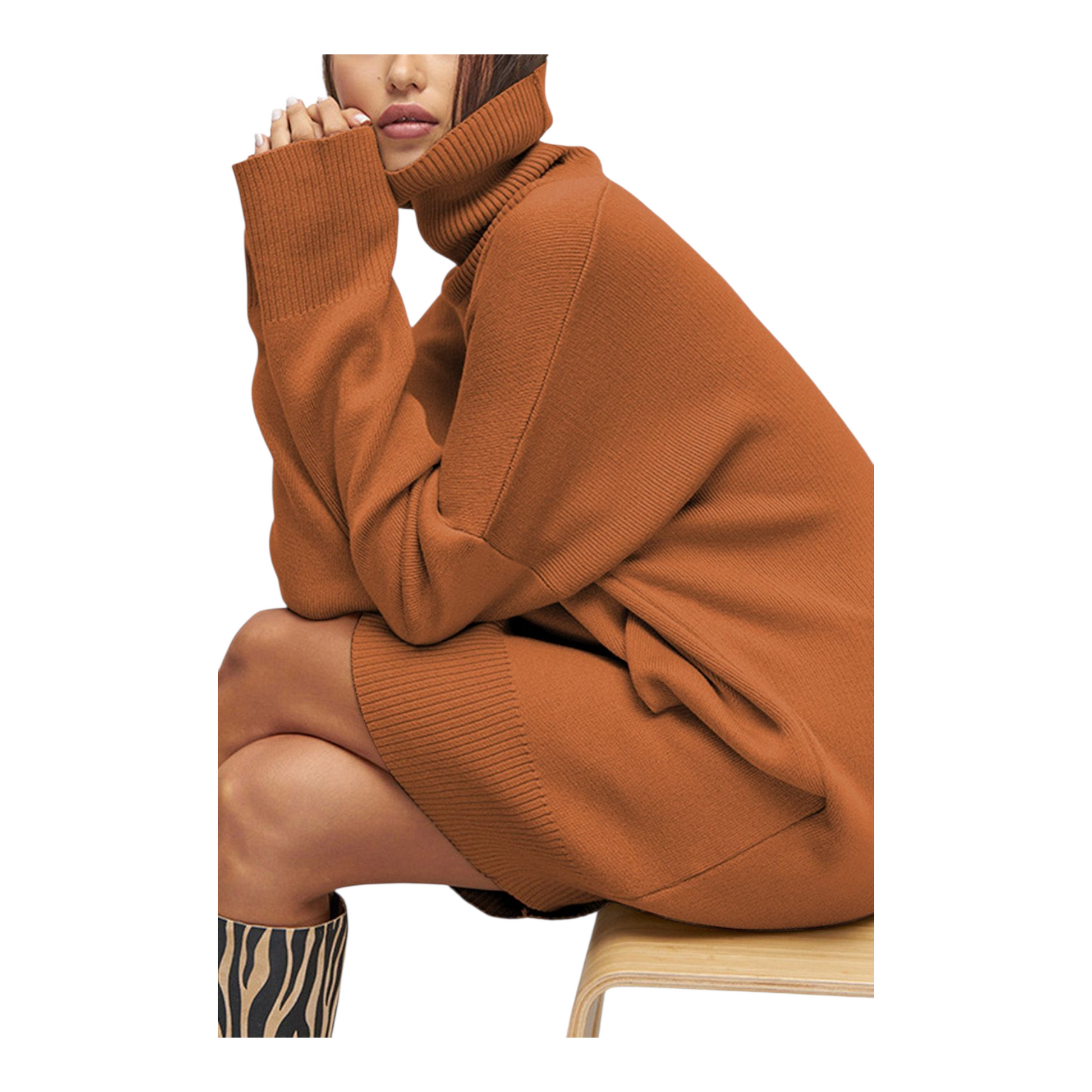 Person wearing a brown oversized sweater on a white background