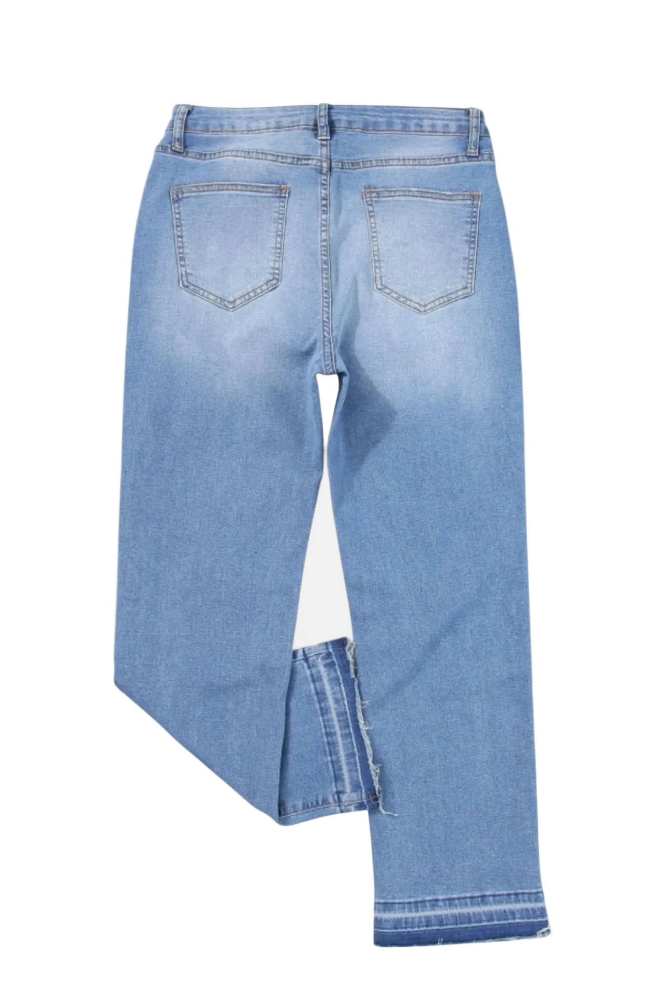 Blue jeans with a unique cut design on a white background