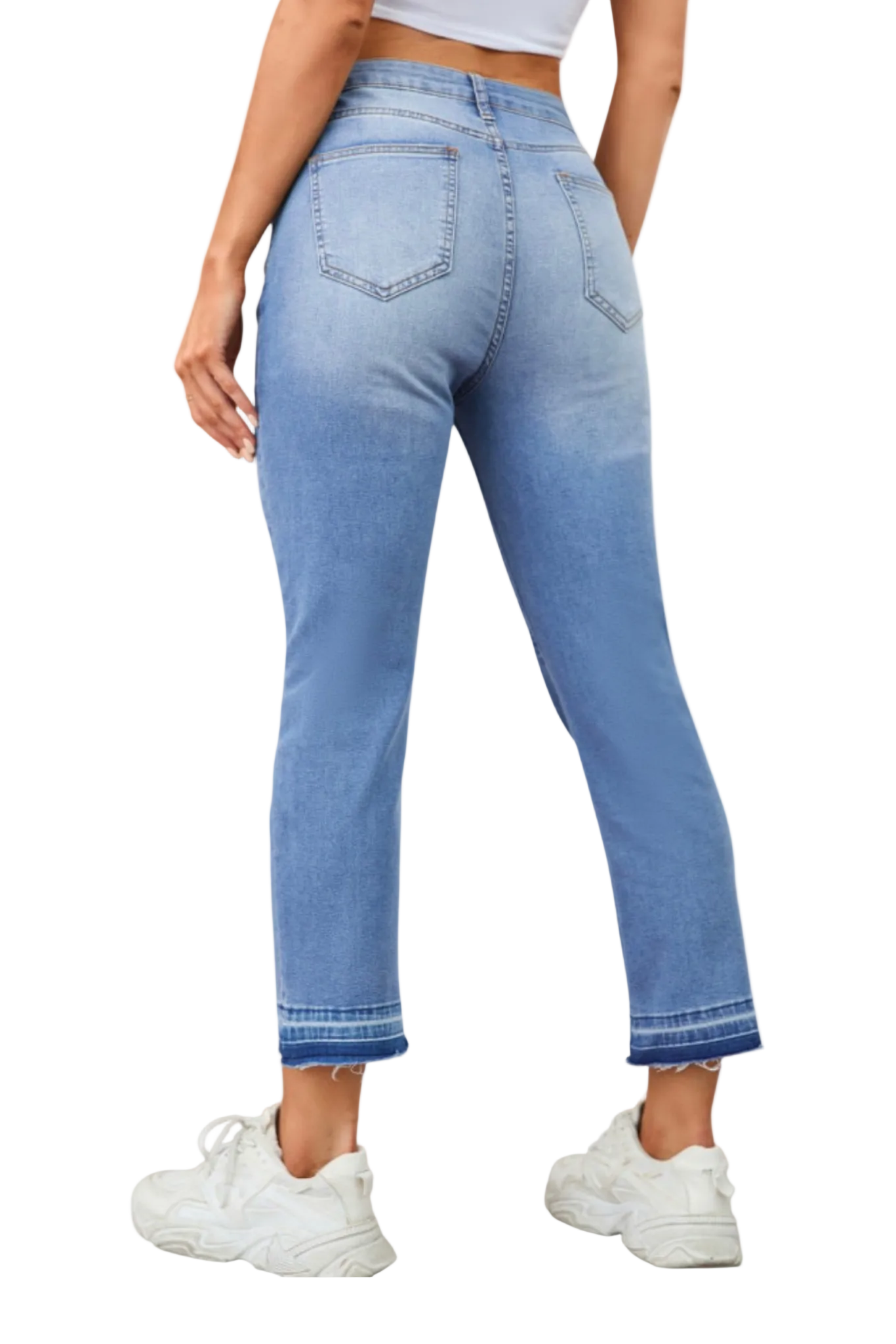 Light blue jeans worn by a person on a white background