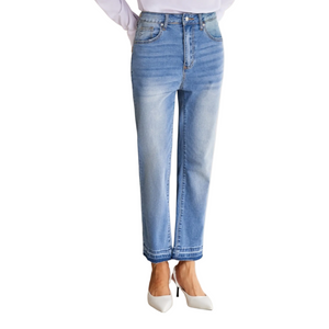 Light blue jeans worn by a person on a white background