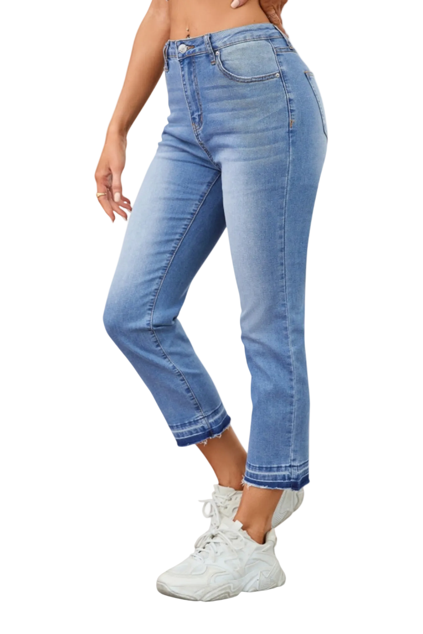 Light blue jeans worn by a person on a white background
