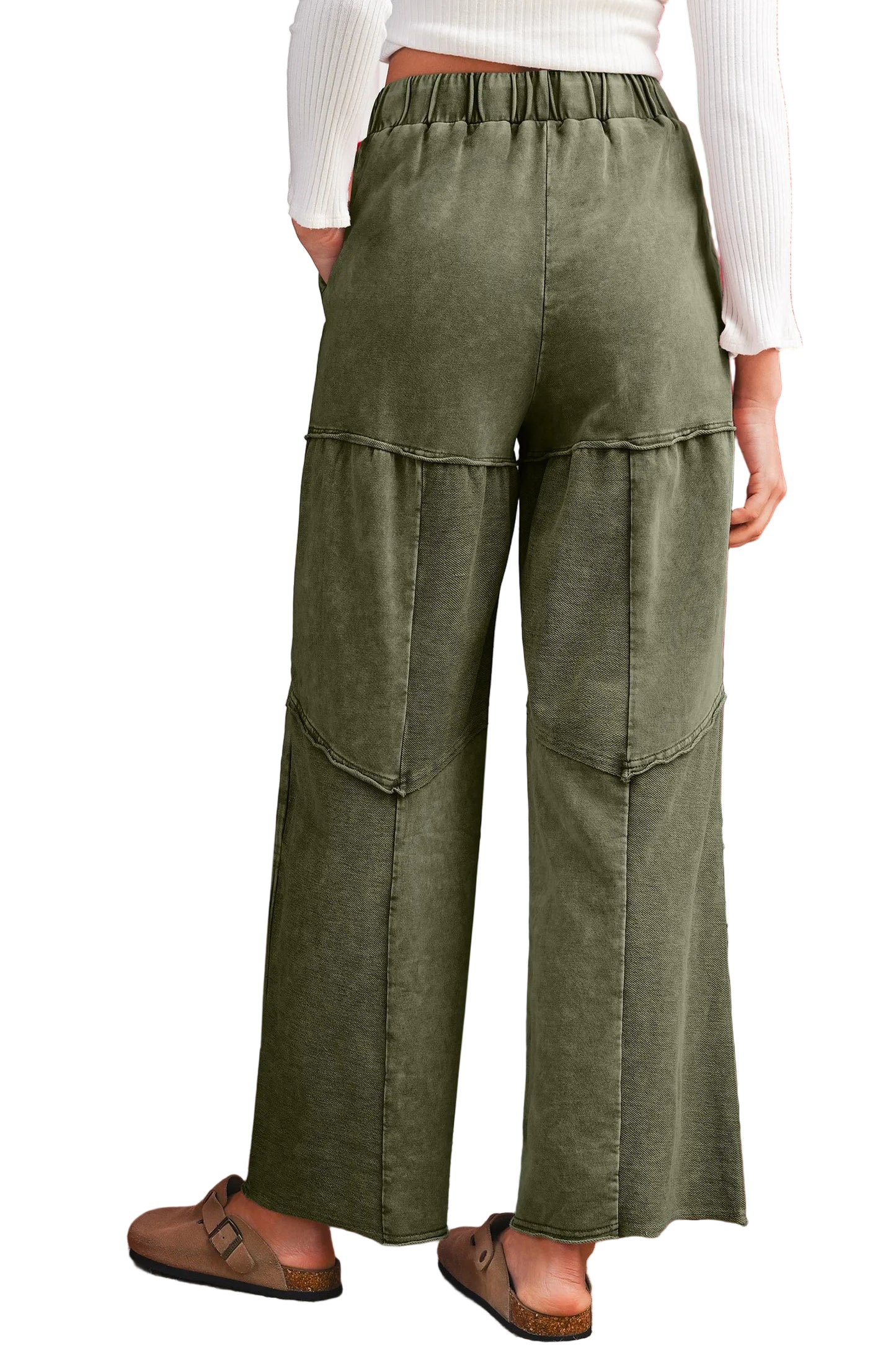 Back view of a green wide-leg pants worn by a person on a white background