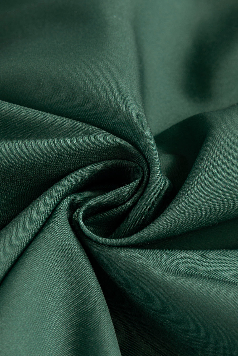 Fabric view of a mist green boho floral mini dress.