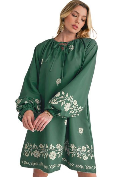 Long puff sleeve mist green boho floral mini dress for casual occasions.