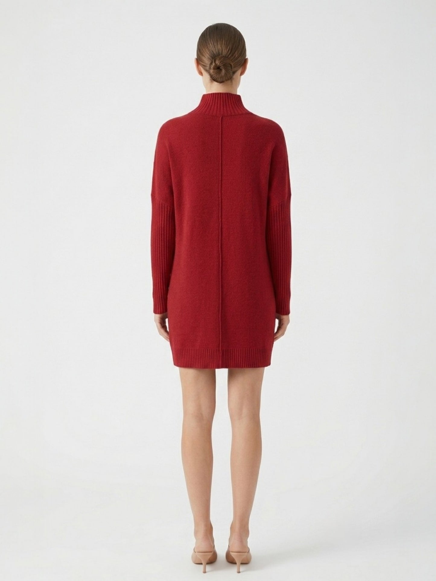 Red sweater dress worn by a person on a white background back view