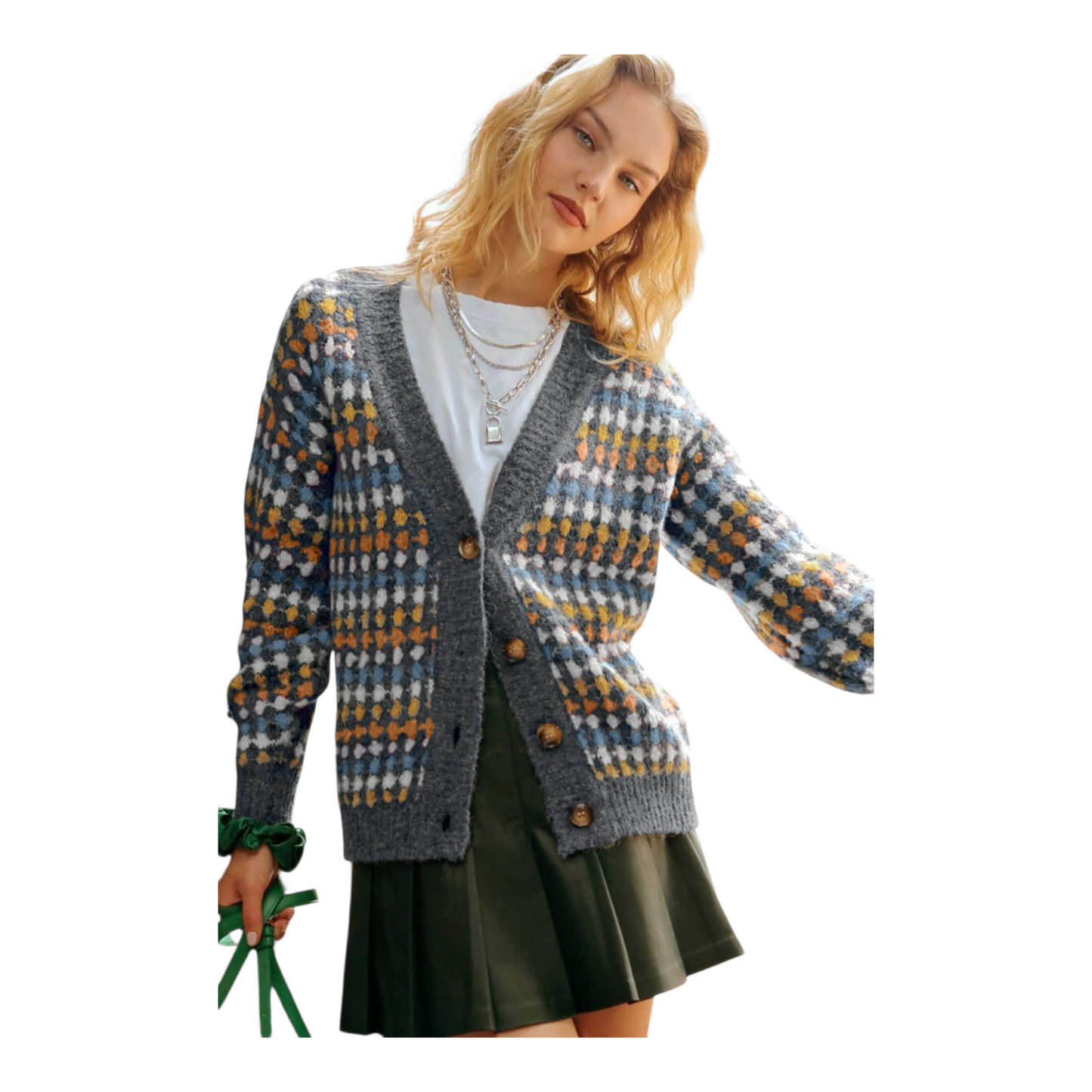 Woman wearing a patterned cardigan on a white background