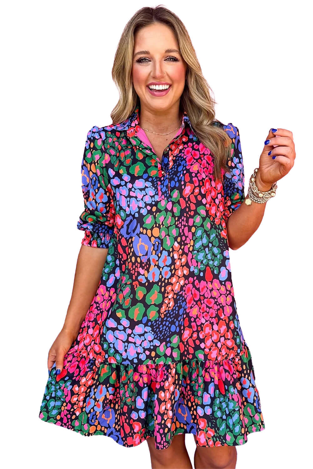 Front view of a multicolor leopard print mini dress with short sleeves, perfect for summer occasions and casual outings, on a white background.