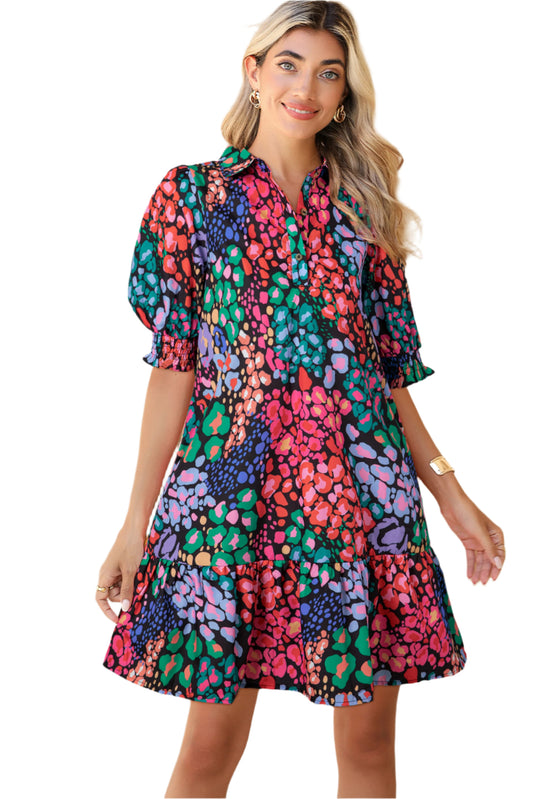 Front view of a multicolor leopard print mini dress with short sleeves, ideal for summer occasions and casual outings.