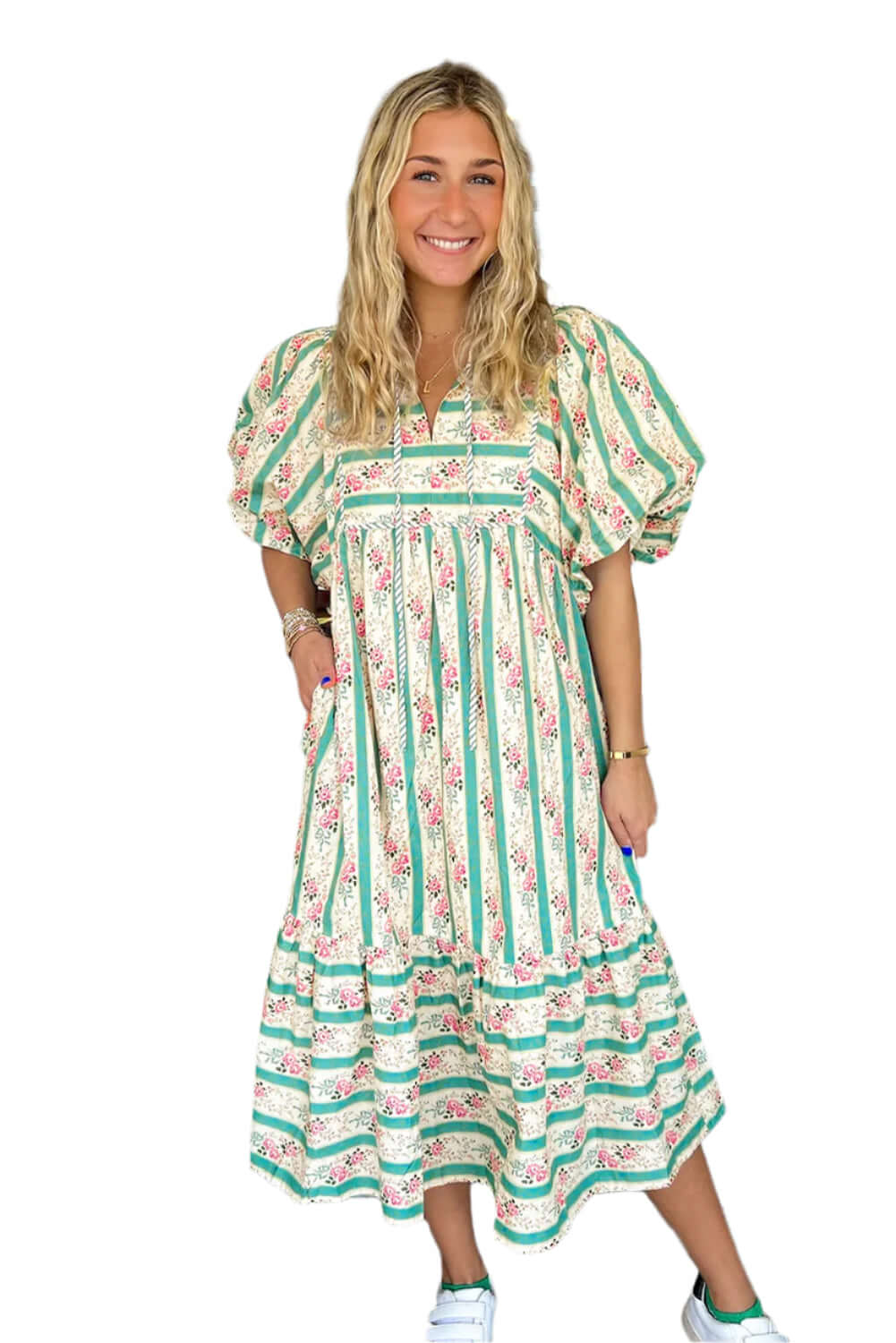 Model wearing a lightweight multicolor maxi dress with pockets, styled for a casual day out.