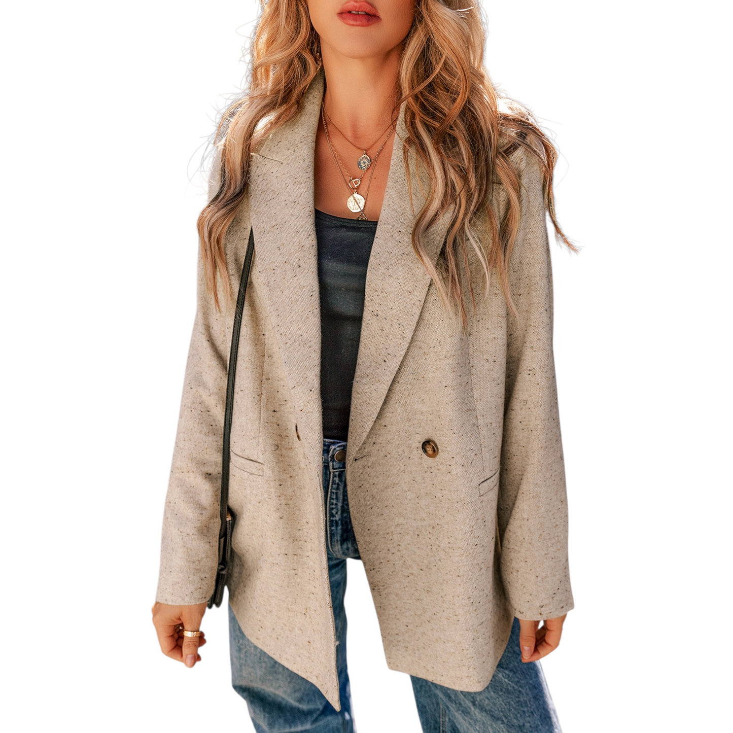 Front close-up of a woman wearing an oatmeal-coloured tailored blazer with a lapel collar and single button.