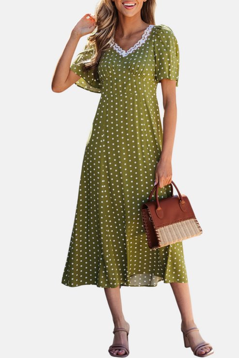 Olive polka dot lace trim smocked midi dress front view styled with tan block heels and rattan leather handbag