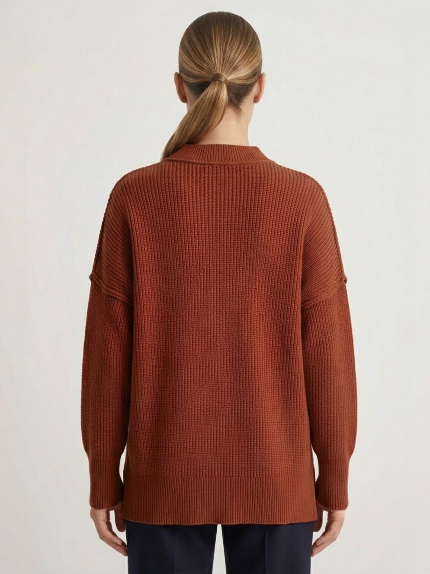 Oversized mock neck ribbed knit sweater in brown, back view