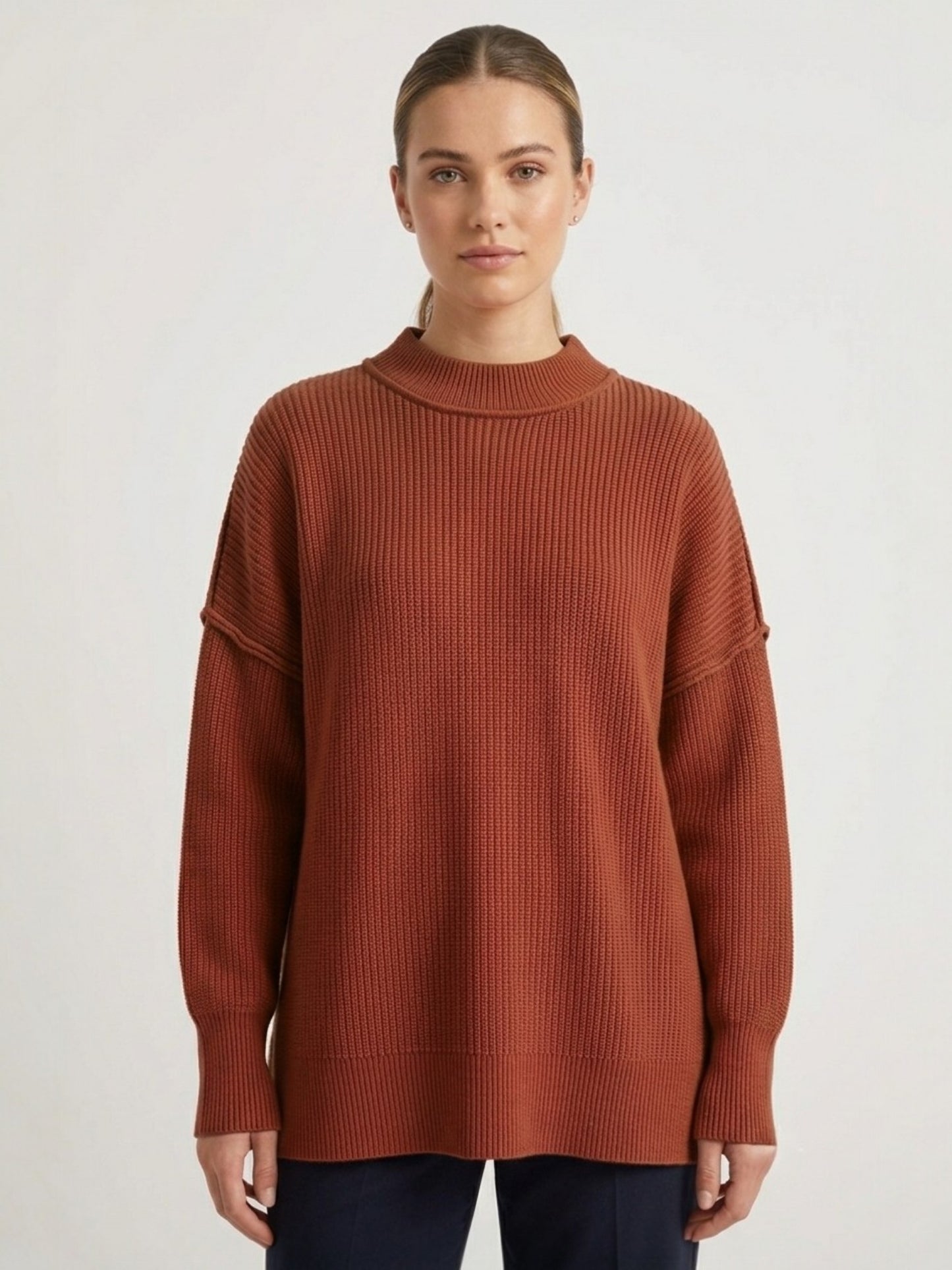Oversized mock neck ribbed knit sweater in brown, front view