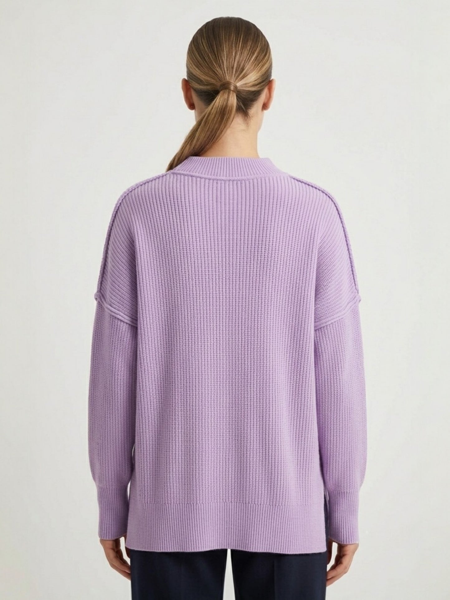 Oversized mock neck ribbed knit sweater in light purple, back view